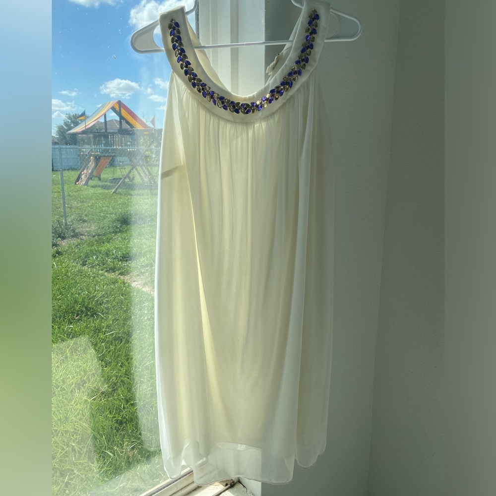 ENFOCUS Ivory mini dress with beaded neckline and ties in the back of neckline